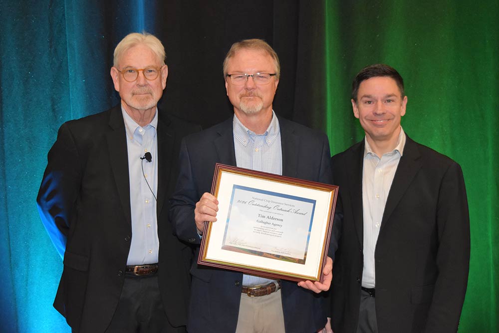 Tim Alderson with Outstanding Outreach Award